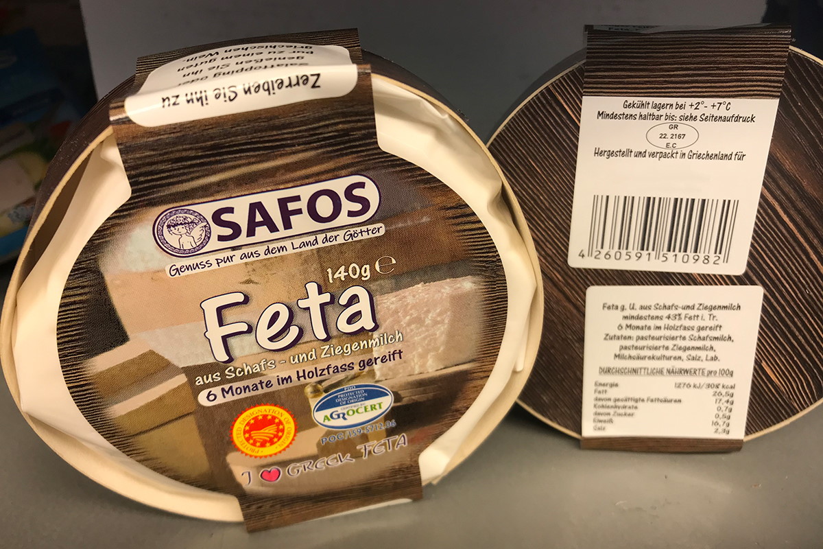 Translation: "Oplossingen Voedsel: Twee-in-een product- en sluitetiket, kleurrijk voorbedrukt, achteraf thermotransferbedrukt met inhoud, MHC, barcode, op kaasverpakking.