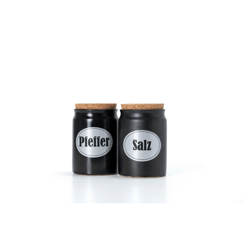 Schwarze Gewürzgläser mit Korkdeckeln, beschriftet mit "Pfeffer" und "Salz".