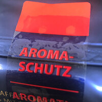 Afsluitlabels: transparant herbruikbaar label, in kleur bedrukt, op koffie verpakking van folie
