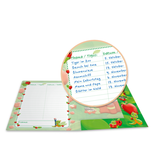 Ein Notizbuch mit buntem Cover, das Themen und Termine auflistet, darunter "Tiger im Zoo" und "Besuch bei Oma".