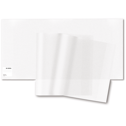 Transparente Folienblätter liegen auf einem weißen Untergrund, teilweise übereinander gestapelt.