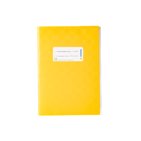 Gelbes Notizbuch mit einem Aufkleber, der Platz für eine Beschriftung bietet.