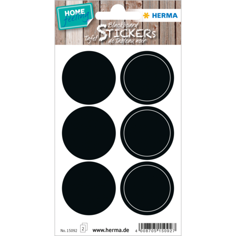 Schwarze Kreise als Tafelsicker, vier Stück auf einem Bogen, geeignet für Beschriftungen oder Dekoration.