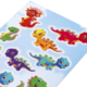 Bunte Dinosaurier-Sticker in verschiedenen Farben und Designs auf einem hellblauen Hintergrund.