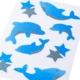 Blau glitterende stickers in de vorm van dolfijnen en sterren op een witte achtergrond.